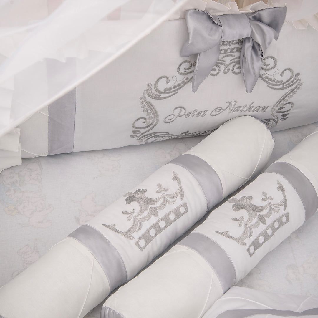 Rolls of white paper with gray decorative ribbons and patterns, featuring the brand 'Peter Nathan'.