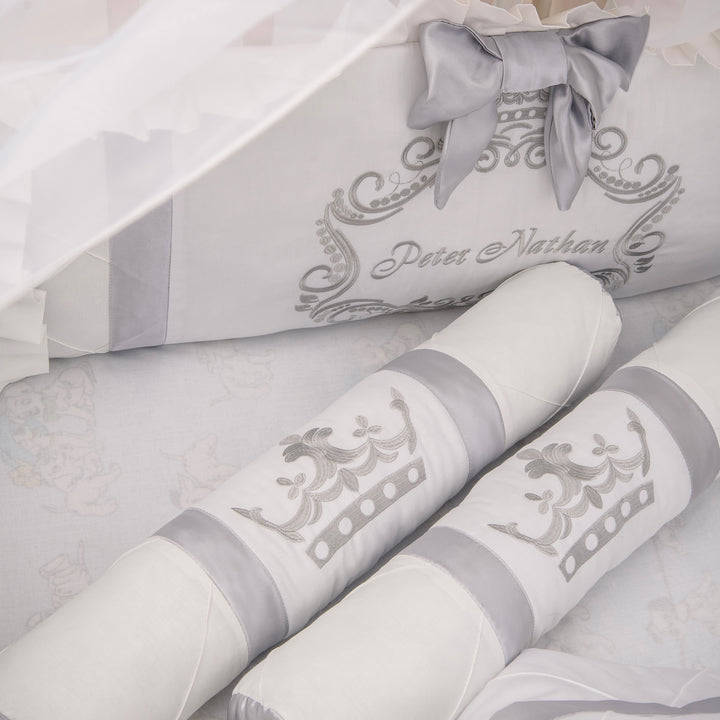 Rolls of white paper with gray decorative ribbons and patterns, featuring the brand 'Peter Nathan'.