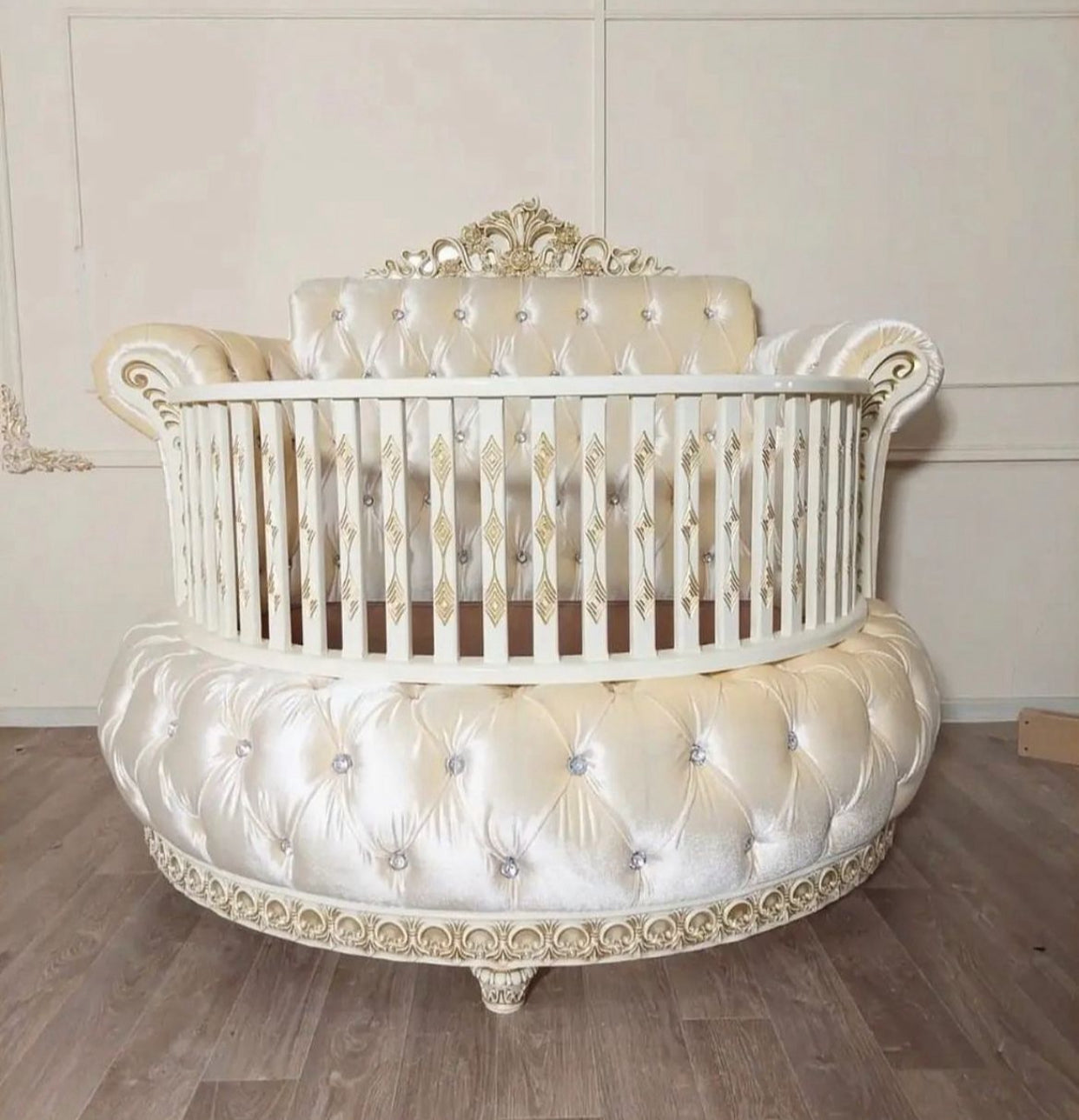 Luxury baby crib bedding set in white and dusty pink with bows and canopy