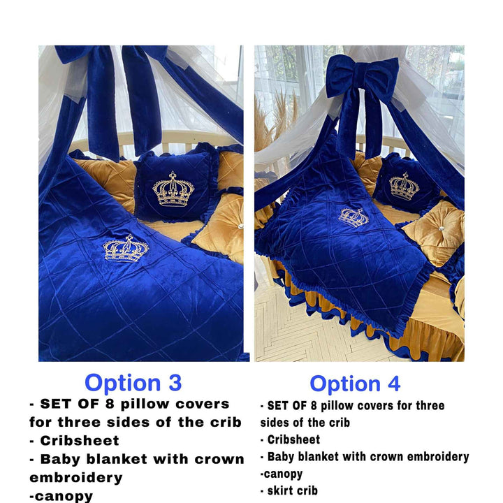 A baby crib bedding set with royal blue and gold colors, including embroidered crowns and ruffled bumpers, with a small crown placed on the baby's crib.